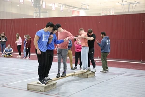 Incoming students at College of the Ozarks receive help from upperclassmen as they move into their dorm rooms. 

